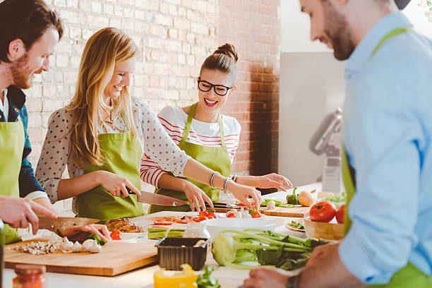 Guests participating in a hands-on cooking class